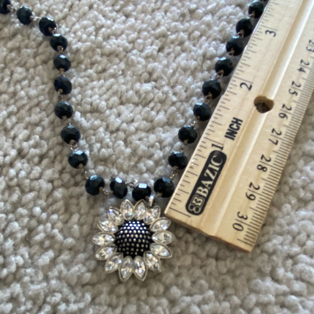 Fossil Necklace, black beaded chain, very sparkly leaves around flower, like NEW